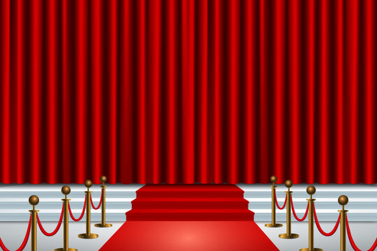 Red carpet leading to stage with velvet curtain
