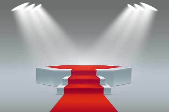 Red carpet leading to illuminated winner stage