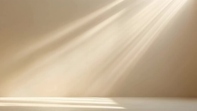 Sunlight streaming through a window onto a light brown wall and floor creating a serene and warm atmosphere in an empty room perfect for product display or background. 4k Footage Video