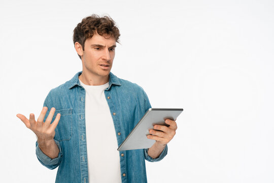 Tablet, confused and studio with man portrait. Internet software glitch, planning or troubleshooting, confused with coding mistake, system solution or test on white background copy space