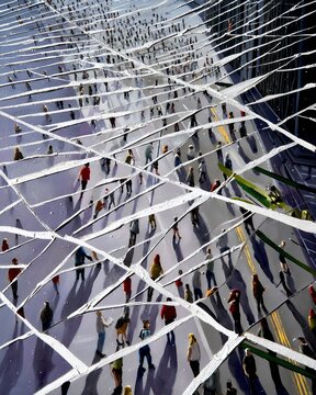 crowd of people seen through broken glass