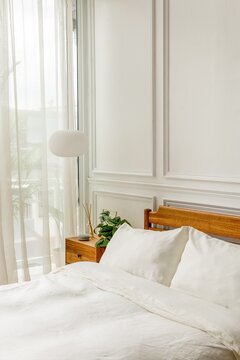 Serene bedroom with natural light.