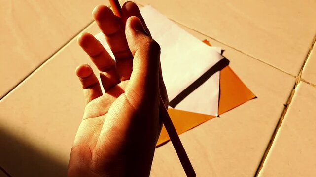 A man in his thirties seeks meaning beneath morning light, his hand tracing words of purpose, proof that learning never ends, no matter how many pages life has turned.