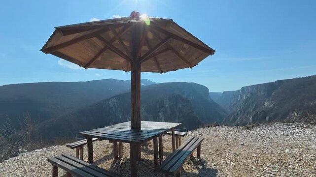 Wooden shelter rests atop rocky cliff edge. Lazarev (Lazar's) Canyon. Balkans, Serbia.
