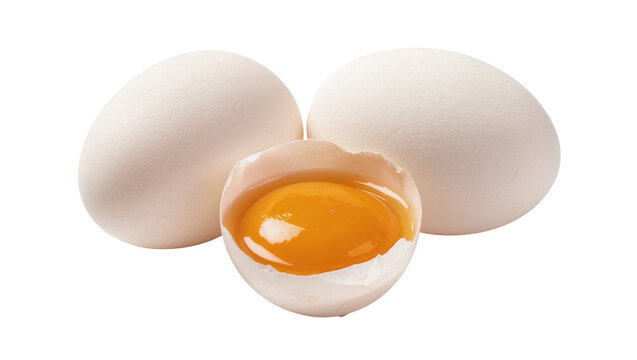 Two whole white eggs and one cracked egg with bright yellow yolk, isolated on transparent background