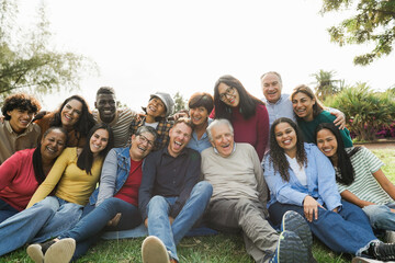 Group of multigenerational people smiling in front of camera - Multiracial friends of different...