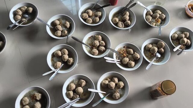 Meatballs in a bowl arranged in a row, Buffet concept