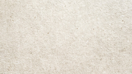 Fototapeta premium Raw concrete wall texture with visible wear and natural imperfections, ideal for architectural visualization and industrial backgrounds.