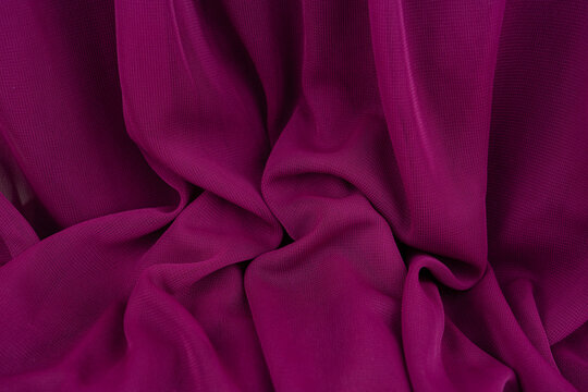 pink fusia soft wavy fabric material background 