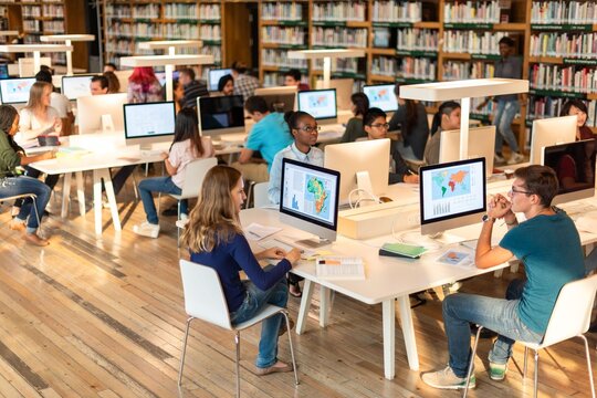 Students collaborating in modern library
