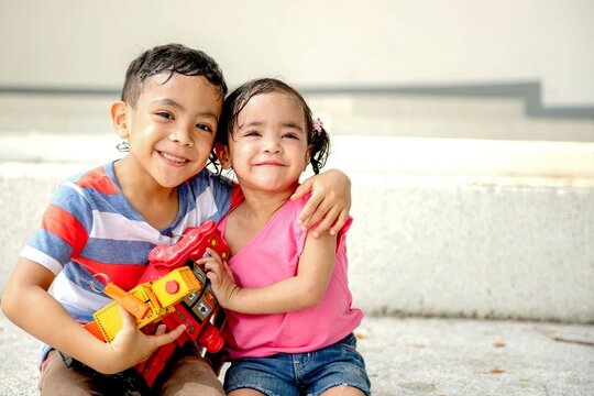 Joyful siblings playing together