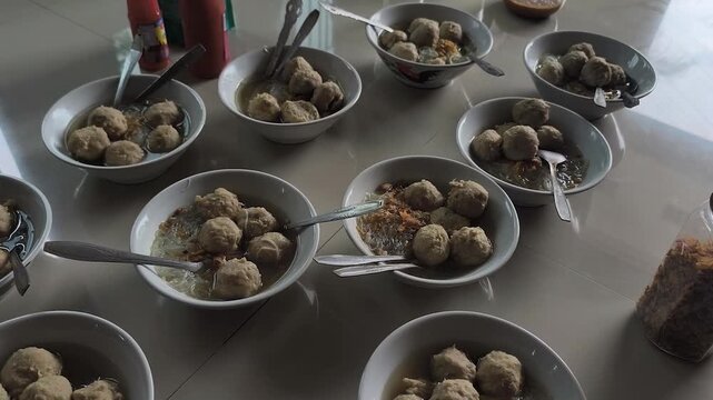 Bakso is a traditional Indonesian food, served in bowls arranged in a row, buffet concept