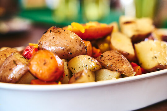 fried potatoes and vegetables with sea salt