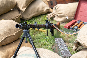 Fototapeta premium WWII German MG 34 machine gun with ammunition and military equipment
