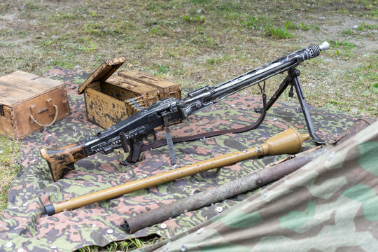 World War II German MG 42 machine gun mounted on a tripod with panzerfaust and ammunition