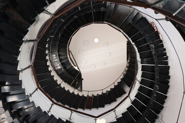 Fototapeta premium Abstract architecture with concentric rings and contrasting shadows