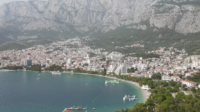 Makarska, Croatia. Coastal town, sea and mountains, Aerial photography from a drone. Croatian town on the Adriatic Sea. Makarska Riviera