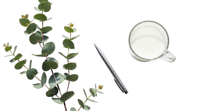 A. Cup of milk on a table with study materials isolated on transparent background