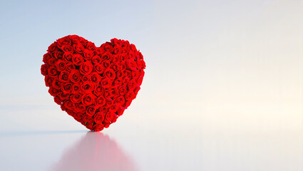 Fototapeta premium Heart shape made of red roses on a clean background 