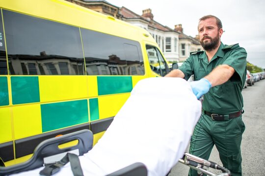 Paramedic assisting emergency situation photo