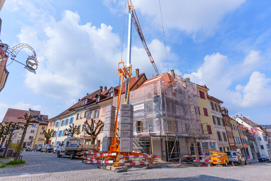 Porrentruy, Switzerland - March 23, 2026: Construction Crane and Scaffolding in Porrentruy, Switzerland