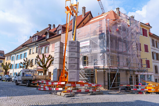 Porrentruy, Switzerland - March 23, 2026: Crane and Scaffolding on Building Site in Porrentruy, Switzerland