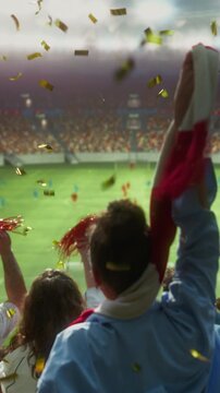 Vertical Screen. Sport Stadium Fans. Back View of Happy Diverse group of Fans in Packed Championship Arena Cheering for Their Soccer Team, Waving Scarves at a Major World League Cup Event.