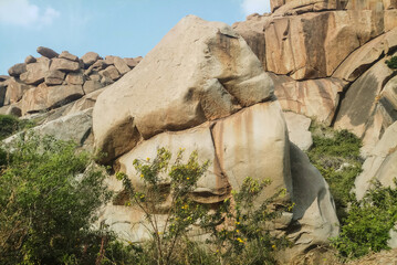 Large weathered granite boulder in Hampi rock landscape © Hemanth