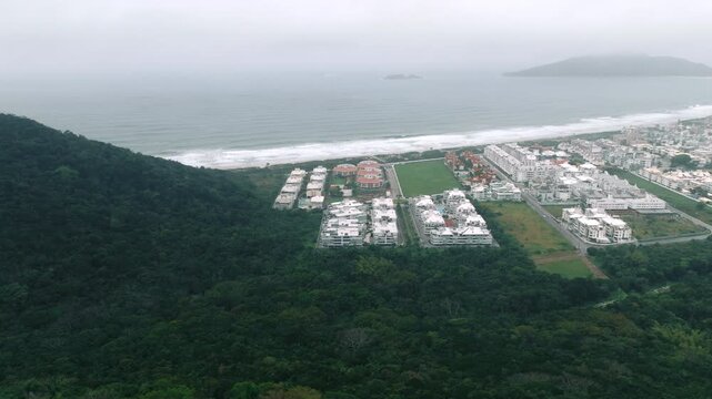 Rainforest and Ingleses district by the coast in drone view