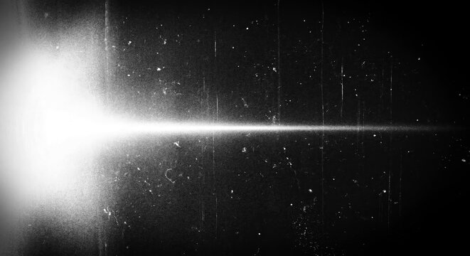 Vintage Monochrome Film Grain Effect Background with Light Bleed and Lens Flare Effect