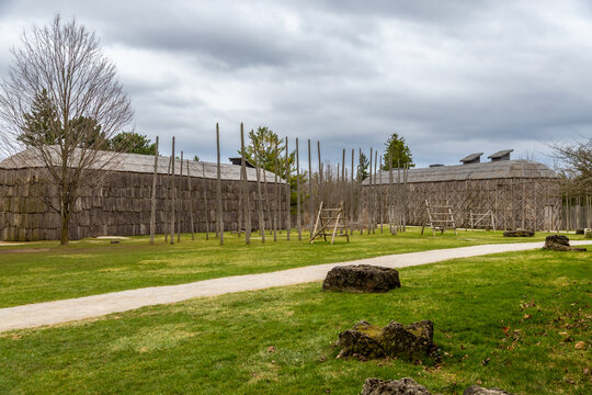 A wooden long houses in a reconstructed 15th century Iroquoian village. Milton, Crawford Lake, Ontario, Canada.