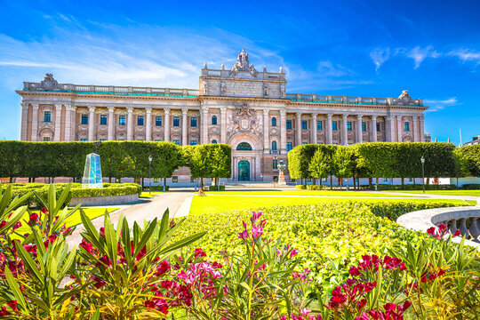 Stockholm, Sweden. Riksplan park and Swedish parliament The Riksdag house front facade view