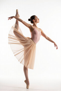 Graceful ballet dancer performing a dynamic jump isolated against a light background for classical dance concepts theater arts and elegant performance design.