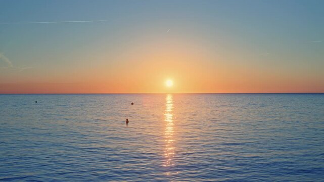 mesmerizing sea with soft waves at sunrise 