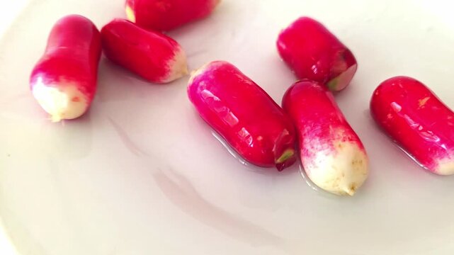 Radishes are cleaned and rinsed with water