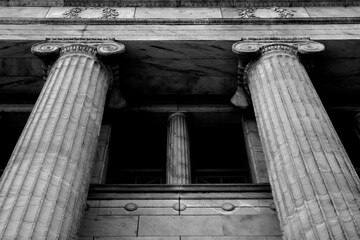 Fototapeta premium Columns on Old Building for Architecture and Design Library Courthouse or Government Building