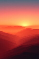 Obraz premium Vibrant orange and yellow sunset illuminates layered mountain ranges casting long shadows in a hazy atmospheric landscape with a clear gradient sky above