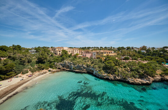 Mallorca coastline with luxury villas overlooking turquoise water