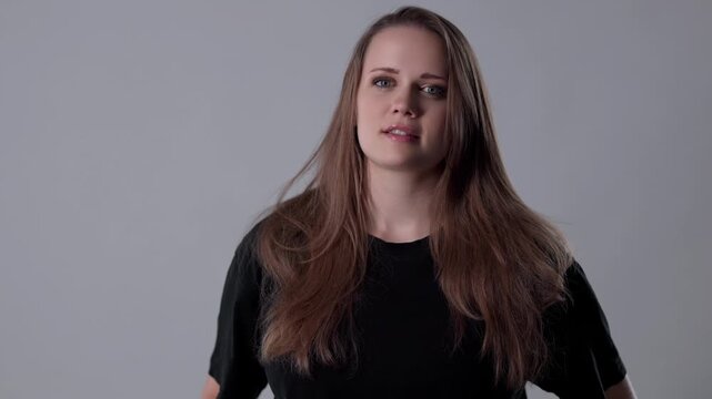 Young caucasian woman with long hair showing a range of emotions from happy to angry