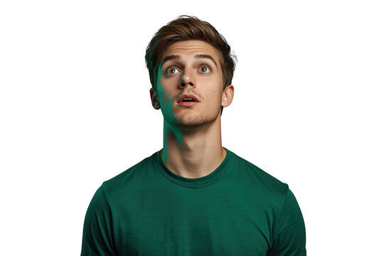 Young man with a surprised expression looking up, experiencing shock and disbelief, feeling wonder and amazement