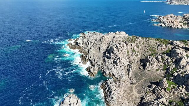 Lateral Drone Flight Along Capo Testa Rocky Coastline in Sardegna
