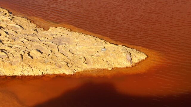 Acid mine drainage polluting a river in Lousal, Portugal