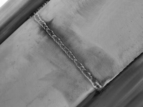 Close-up of a weld seam in black and white