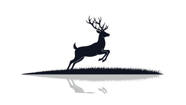 Elegant black silhouette of a male deer with large antlers jumping over a grassy field with a reflection on water.