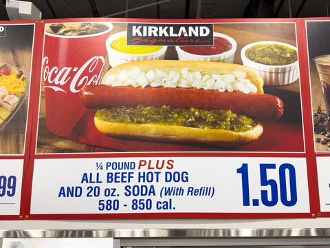 Food court menu sign showing hot dog and soda combo deal