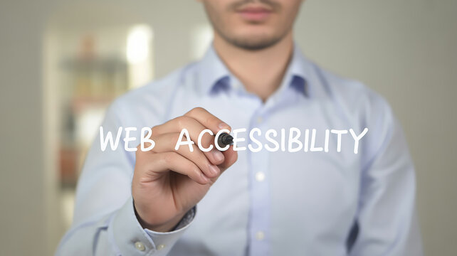 A professional marketing image showing a person in a light blue button-up shirt writing the text web accessibility in white letters on a clear surface