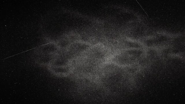 Vintage dark grunge space background loop with a black and white textured chalkboard pattern featuring smoky gray paper effects and an empty old wall backdrop design