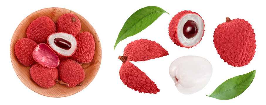 lychee fruit in wooden bowl isolated on white background. Top view. Flat lay