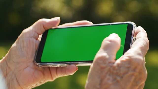 Hand Holding Smartphone Green Screen - Mobile App Screen Mockup