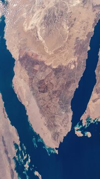 Vertical rotating over Sinai Peninsula Egypt satellite view from space based on Nasa imagery